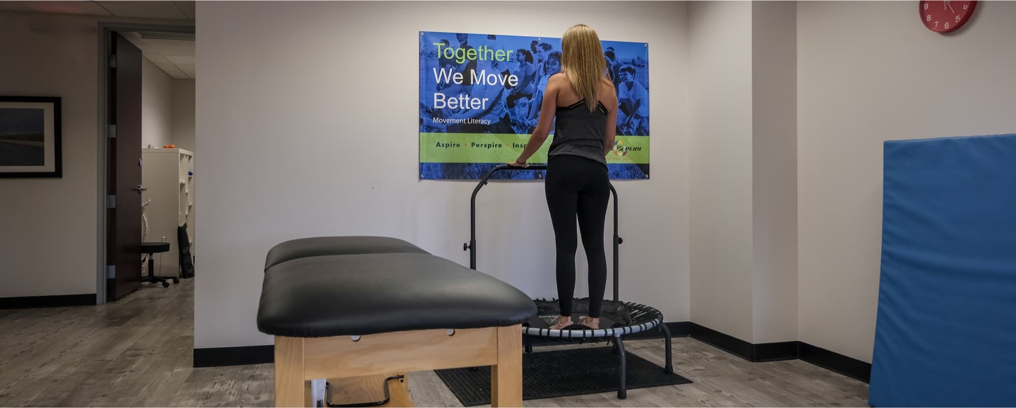 A patient training on a rebounder at Alliance Physical Therapy